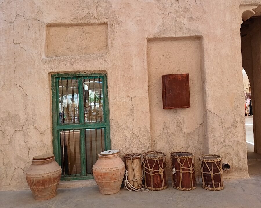 a group of pots sitting in front of a building