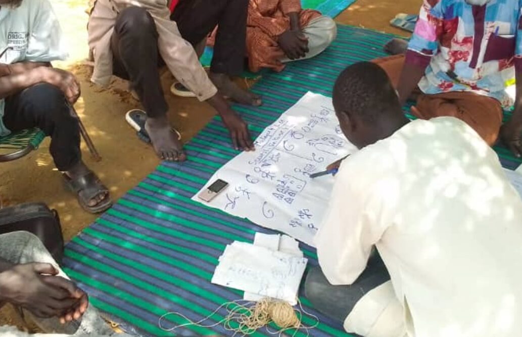 three women carrying basin while walking barefoot