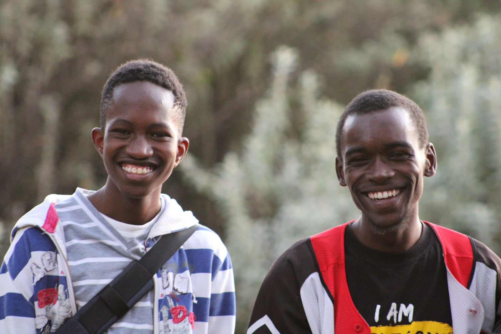 a couple of men standing next to each other